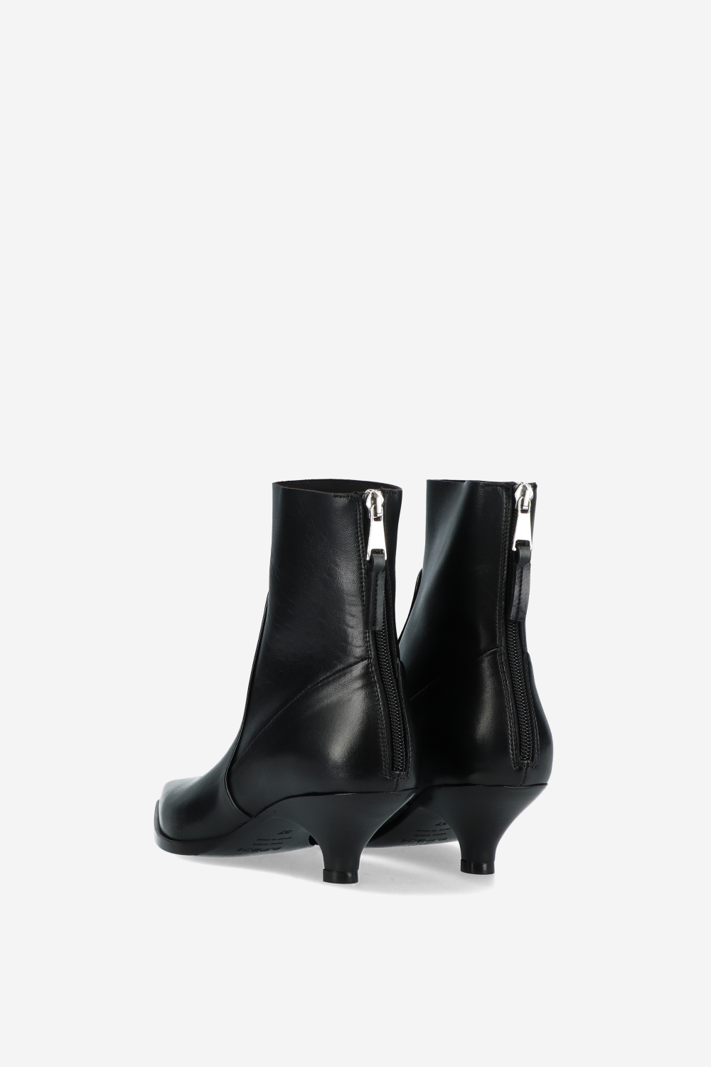 Pointed toe leather boots