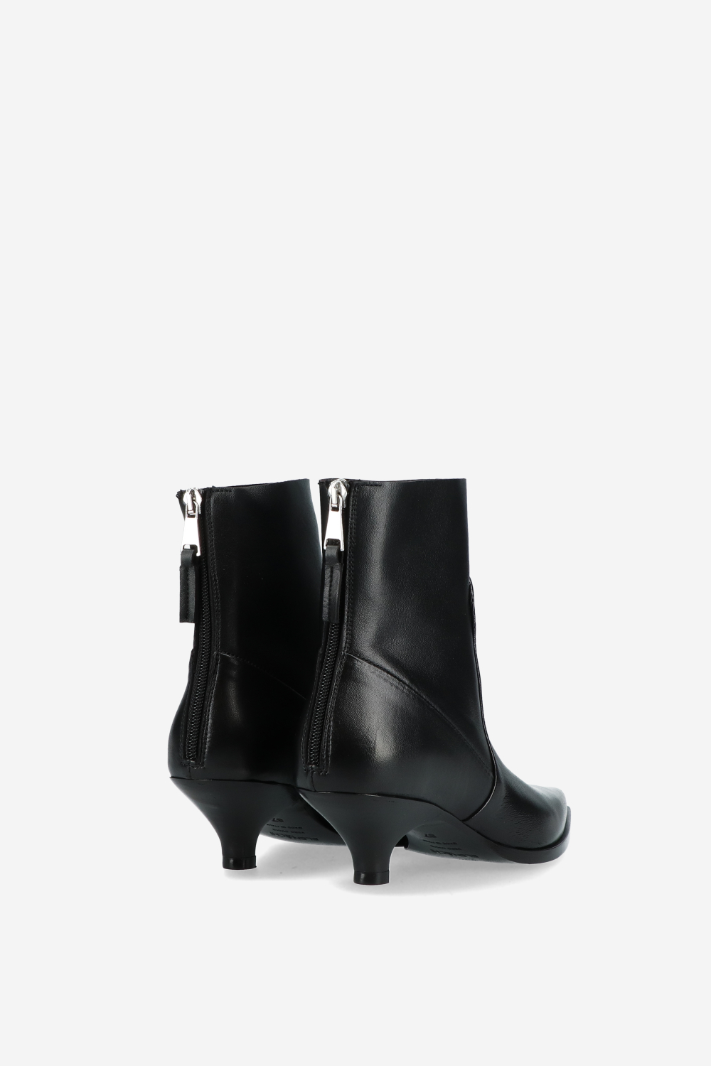Pointed toe leather boots