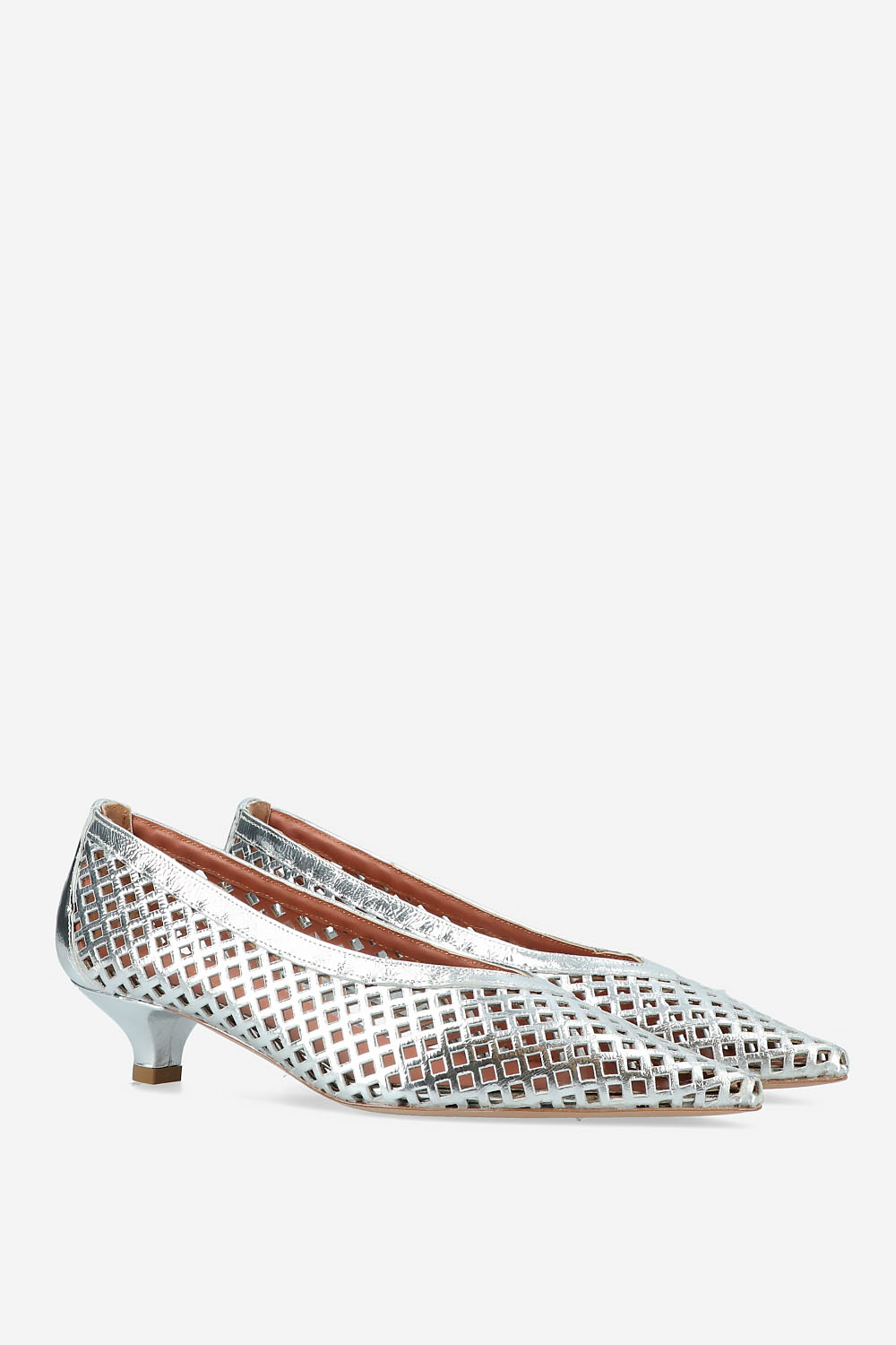 Perforated leather pumps