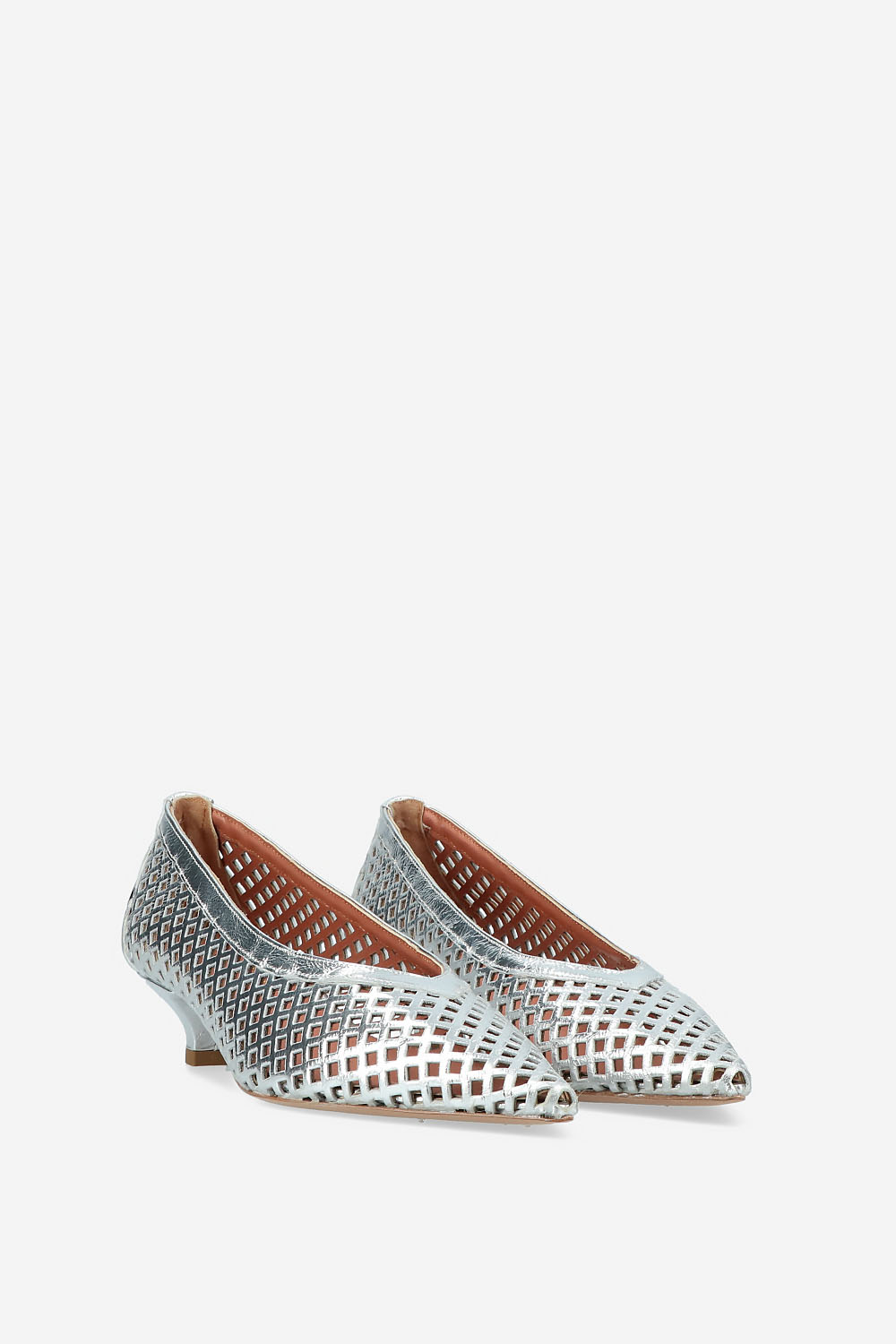 Perforated leather pumps