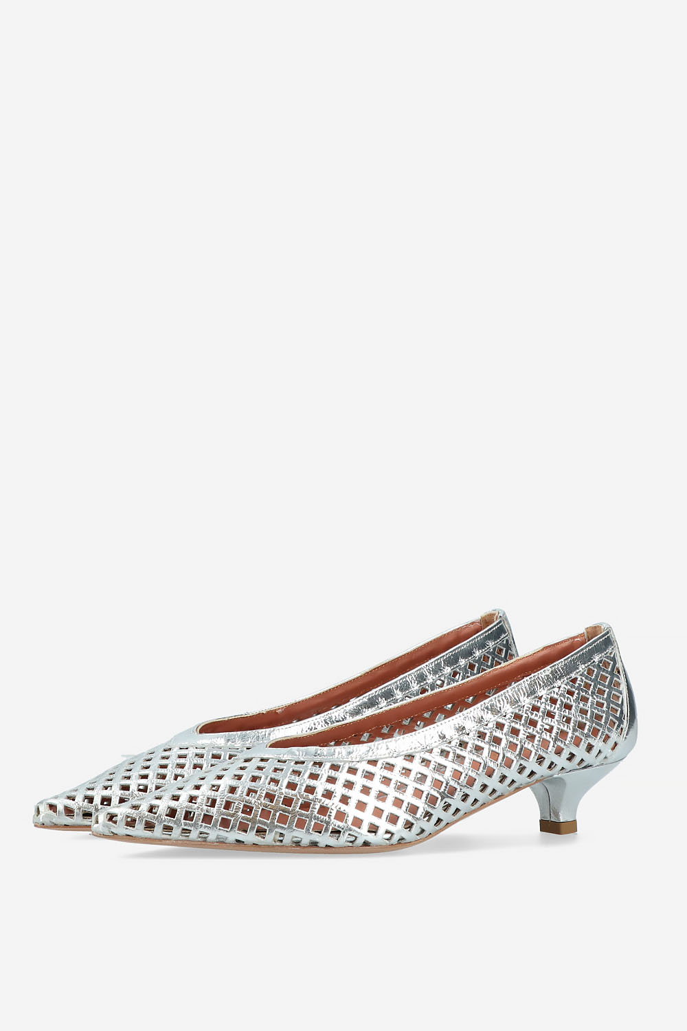 Perforated leather pumps