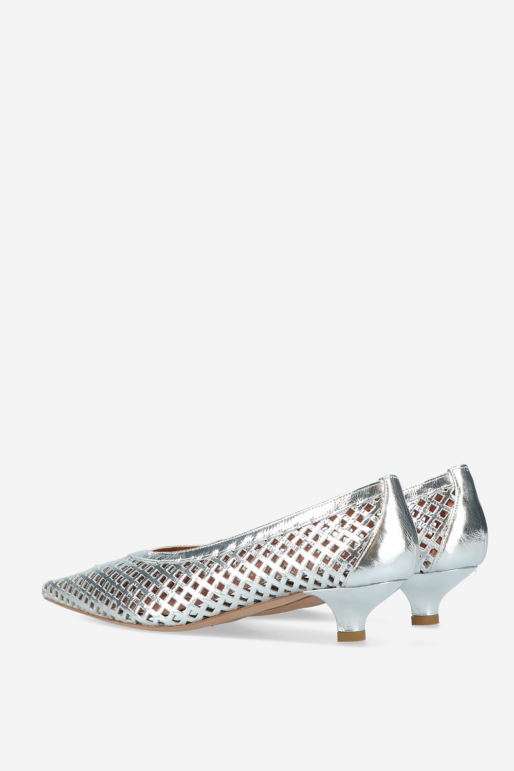 Perforated leather pumps