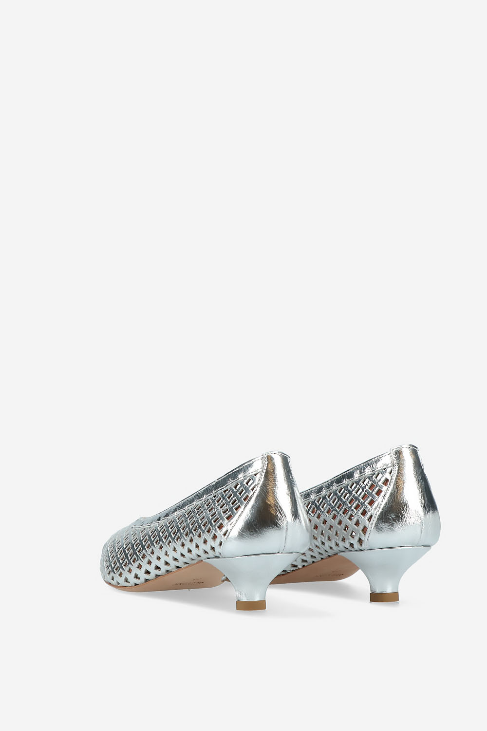 Perforated leather pumps