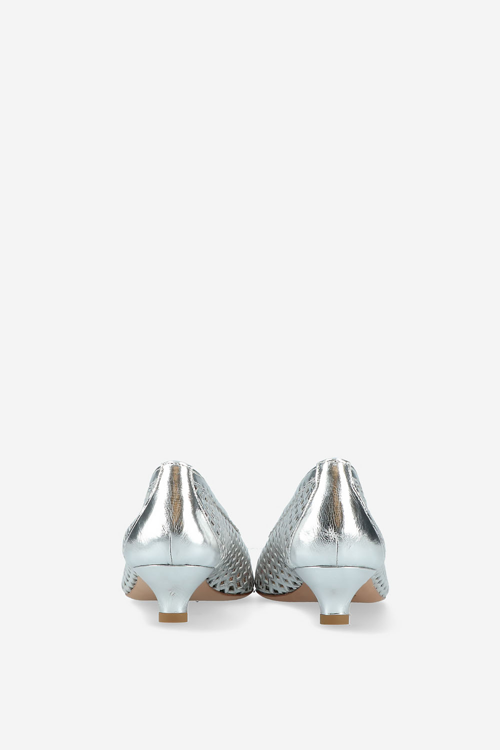 Perforated leather pumps