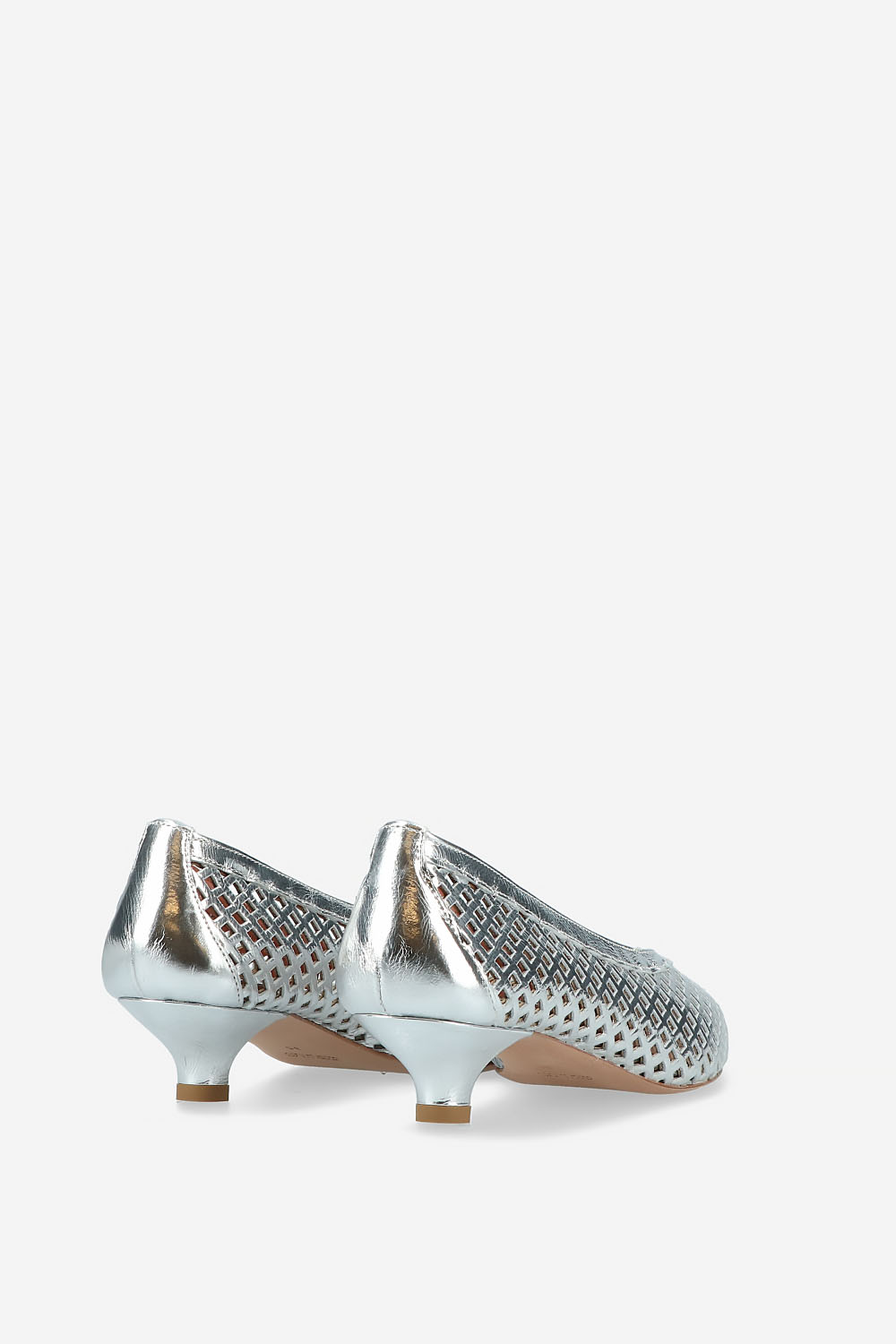 Perforated leather pumps