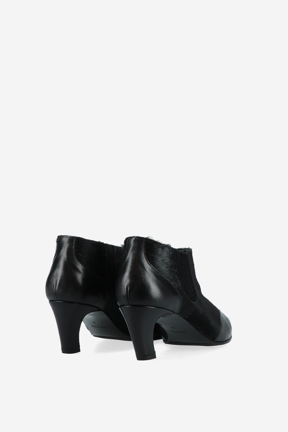 Pony hair leather ankle boots