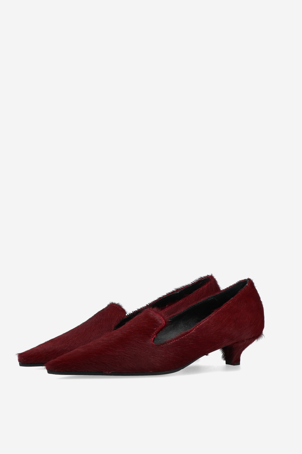 Pointed-toe pony hair pumps