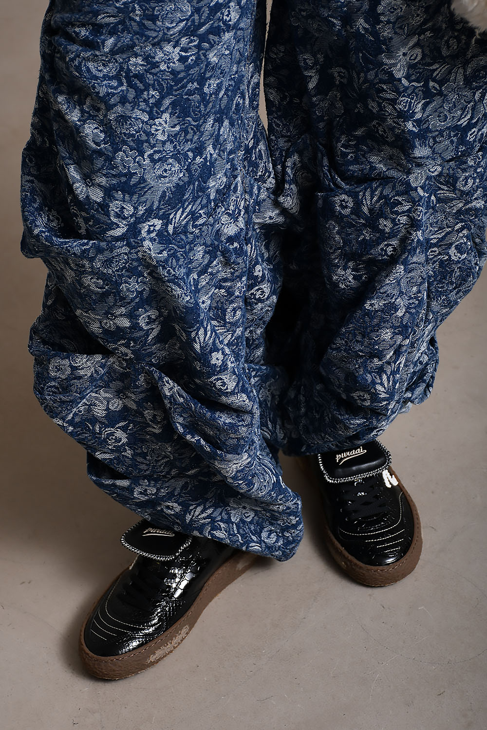 Tapestry denim draped jeans