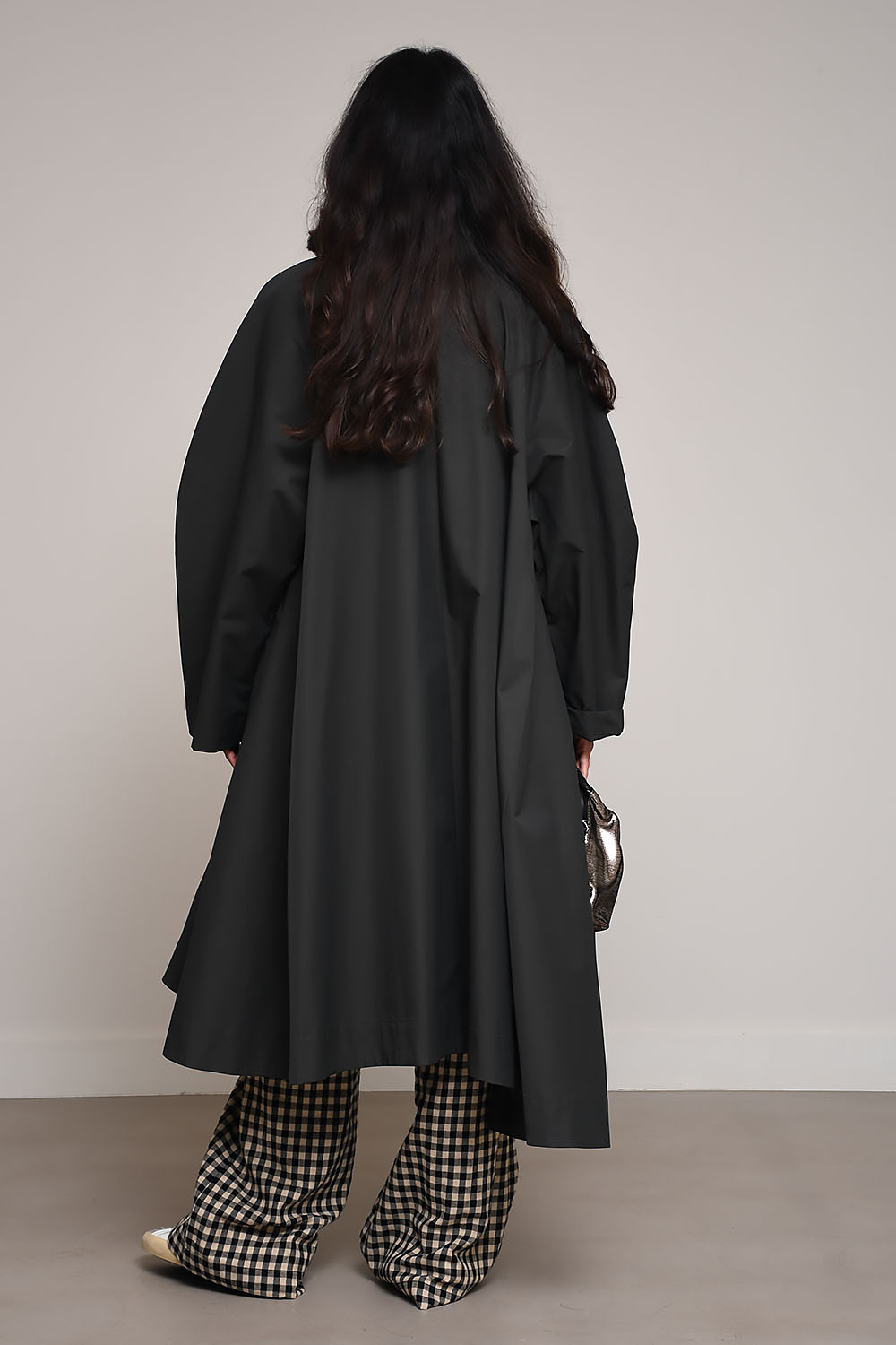 Asymmetric trench coat