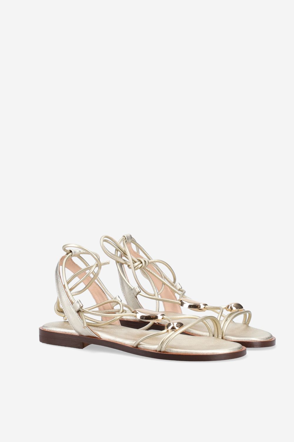 Knotted emblemished leather sandals