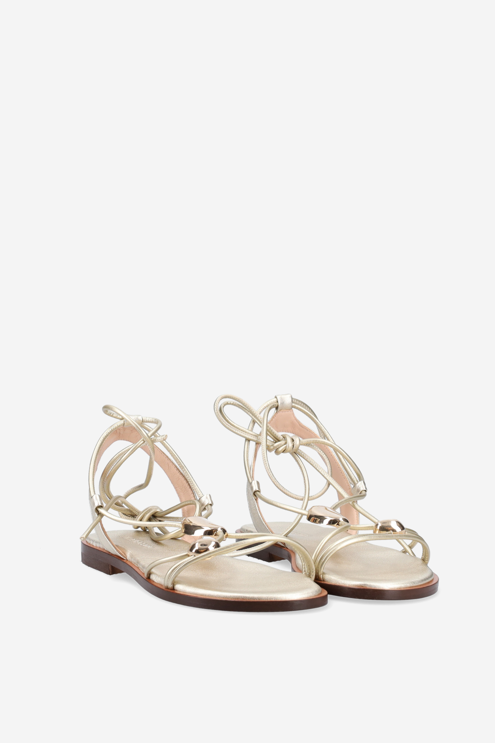 Knotted emblemished leather sandals