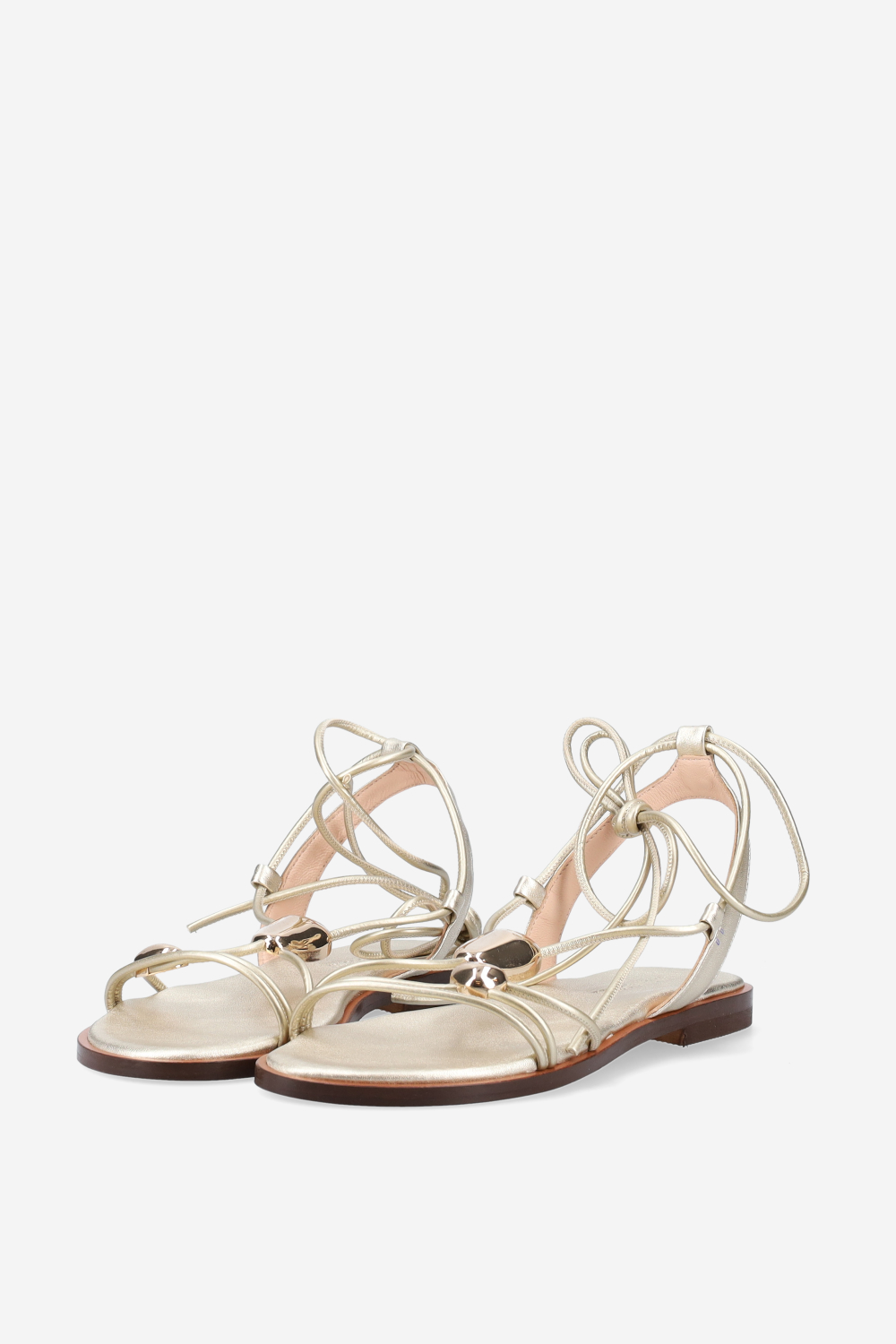 Knotted emblemished leather sandals