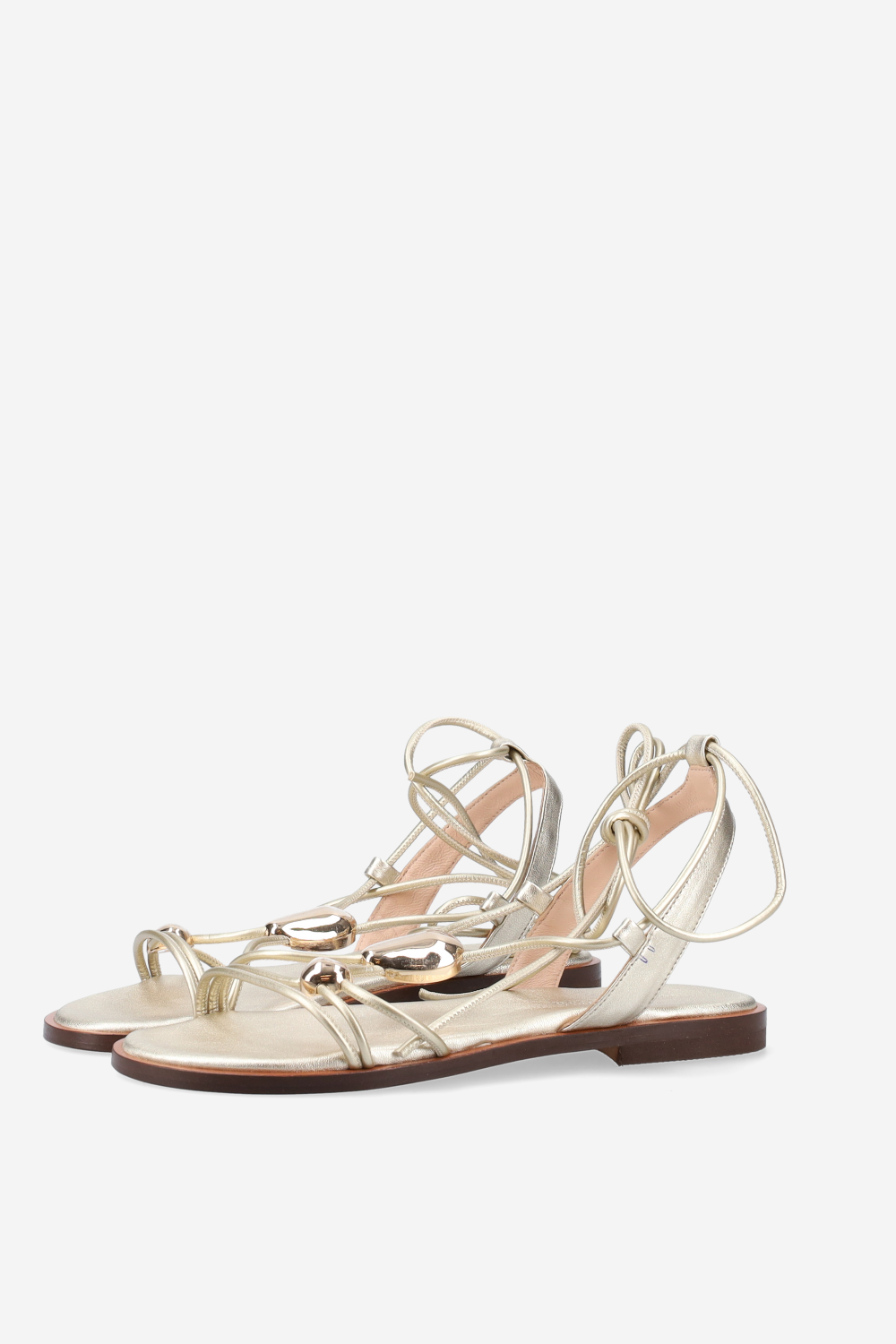 Knotted emblemished leather sandals