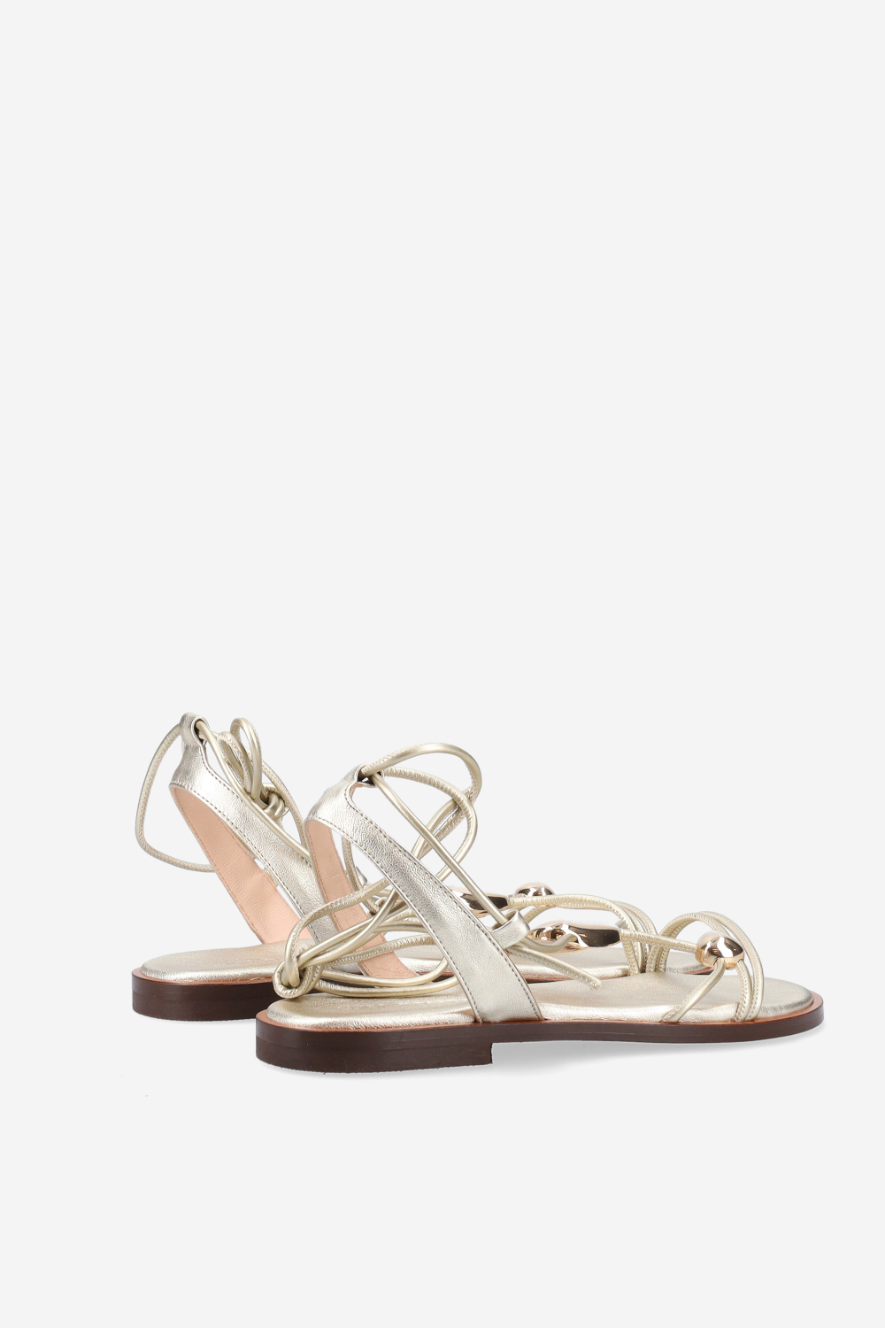 Knotted emblemished leather sandals
