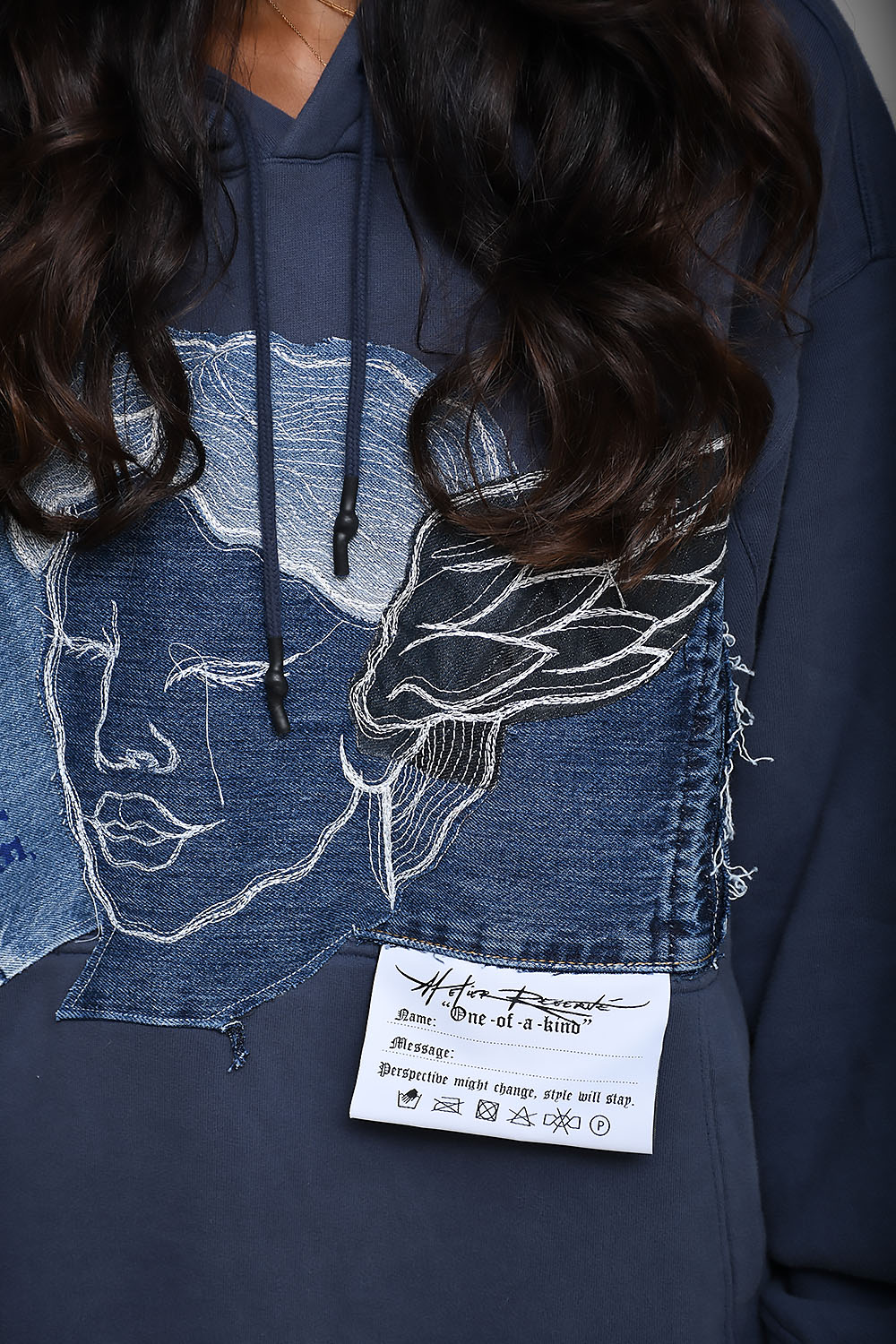 Hand embroidered angel figure hoodie