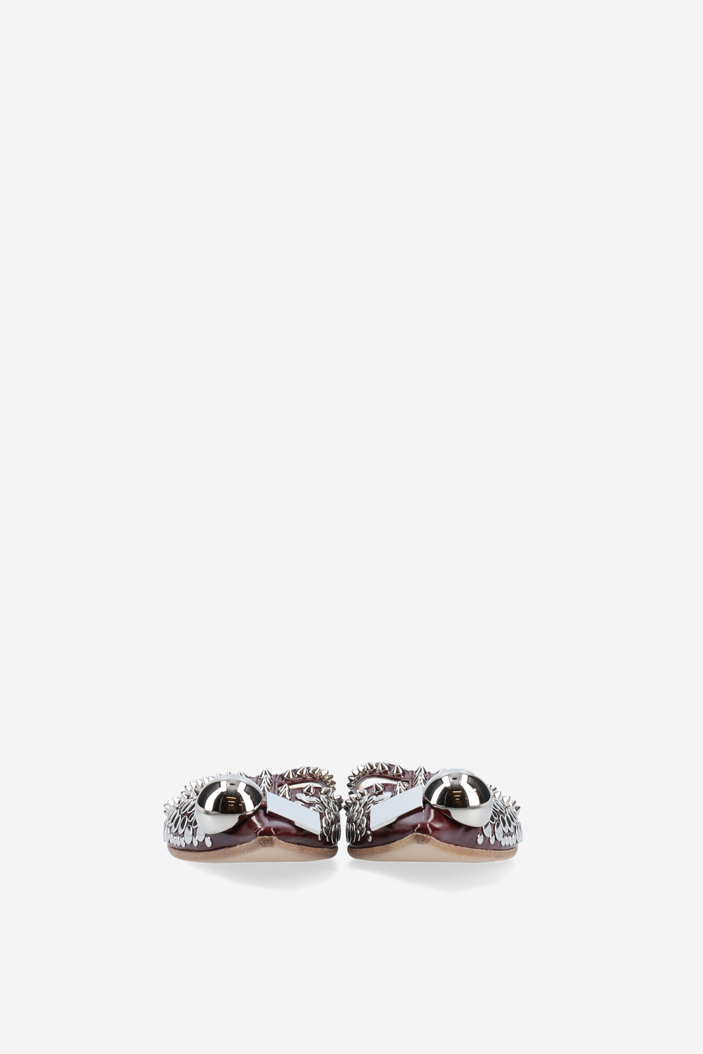 Rock studded patent leather mules