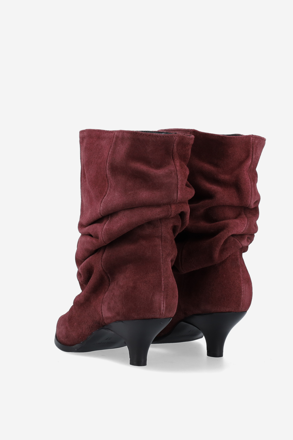 Pointed-toe draped ankle boots.